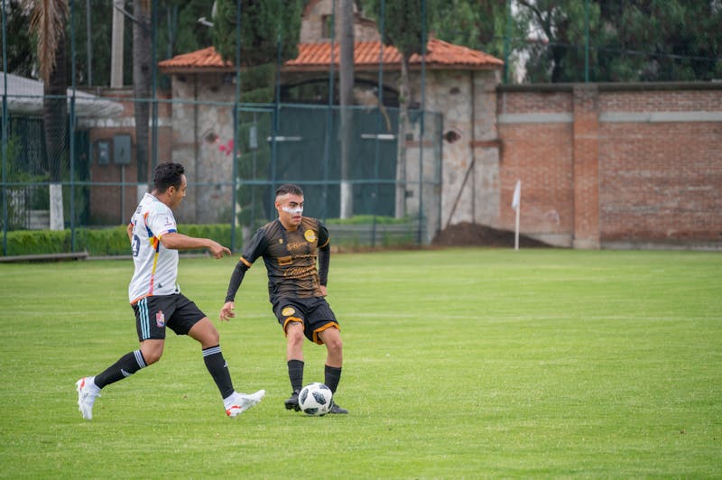 Soccer player passing ball
